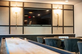 Game lounge with shuffleboard